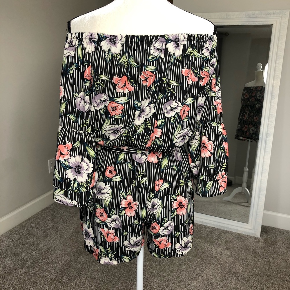 Off the shoulder 3/4 length sleeve romper.